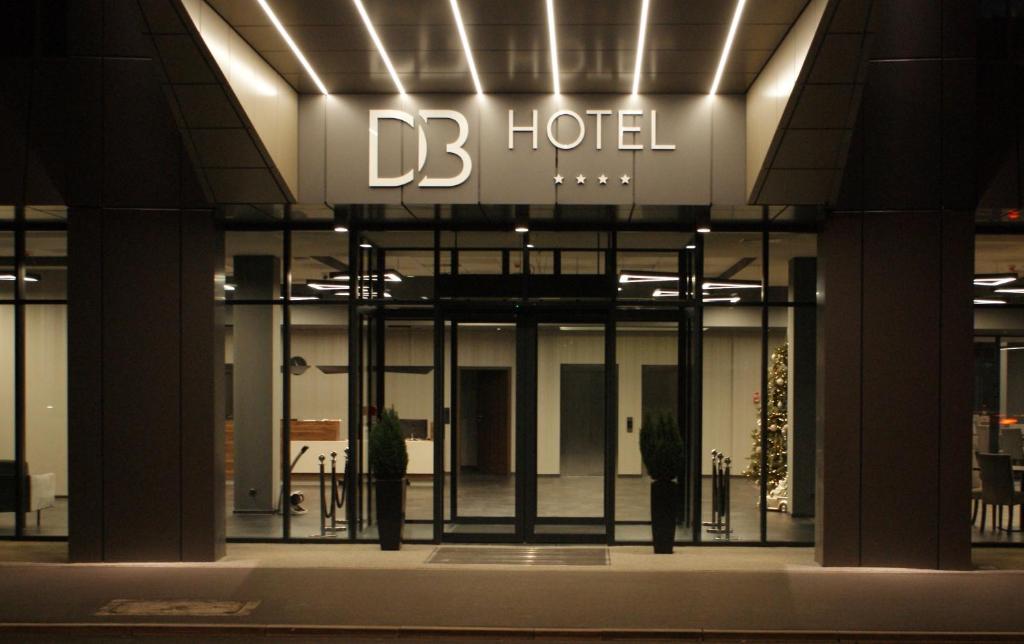 a building with a sign that readsdb hotel at DB Hotel Wrocław in Wrocław