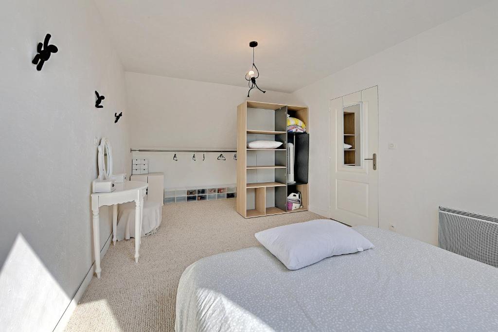 Posteľ alebo postele v izbe v ubytovaní La Coquelière - Belle maison pour 5