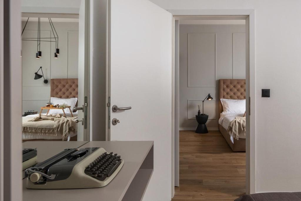 Postel nebo postele na pokoji v ubytování Apartment Centro Pola