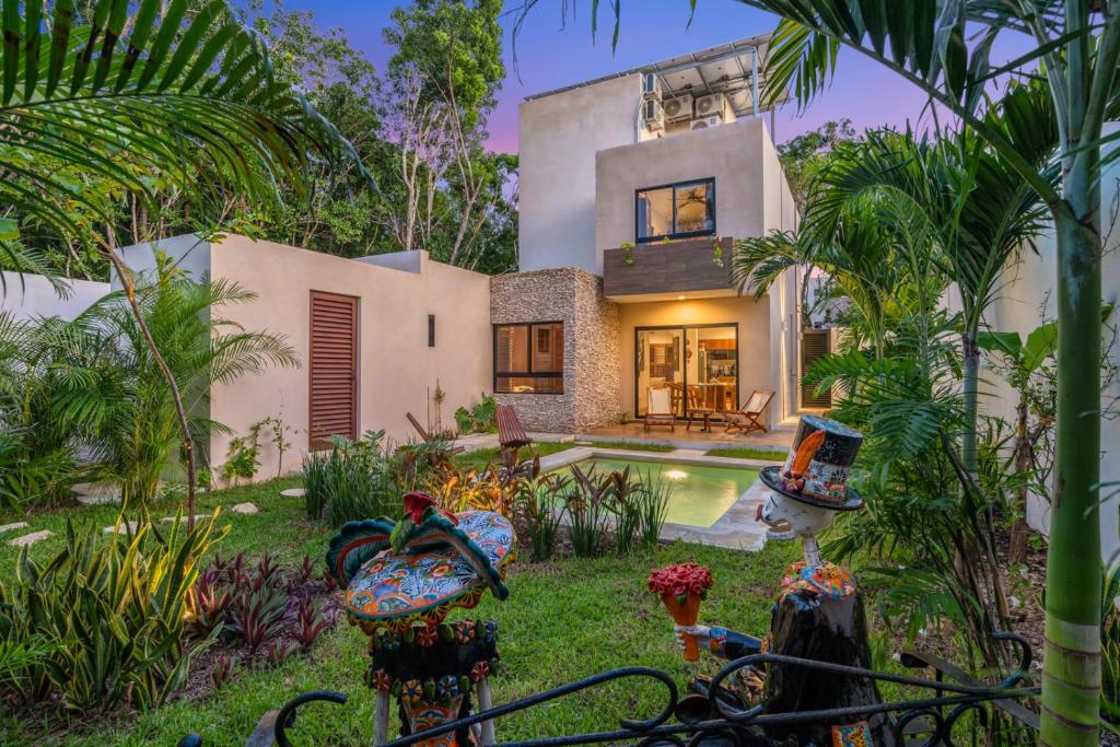 a house with a swimming pool in the yard at Private Tulum Villa in Exclusive Secured Community in Tulum
