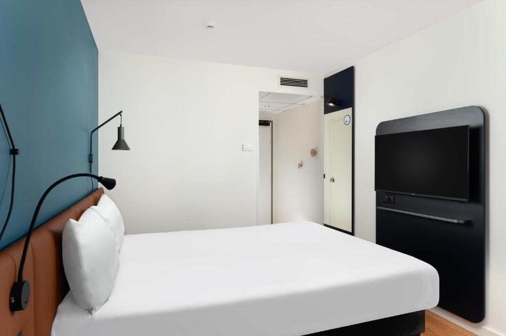 Postel nebo postele na pokoji v ubytování Ibis Budapest Centrum