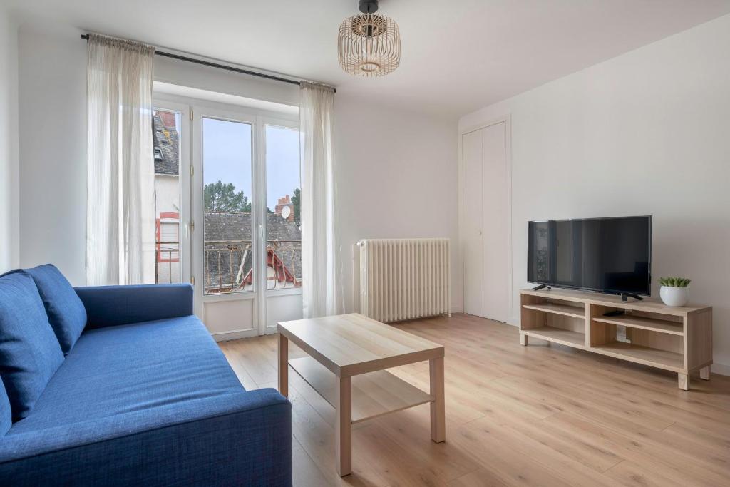Televízia a/alebo spoločenská miestnosť v ubytovaní Appartement à 350 mètres du Port du Pouliguen!