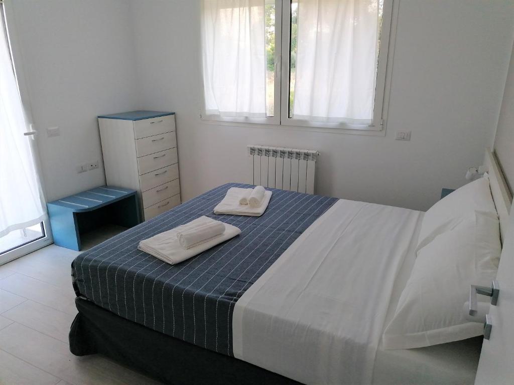 Posteľ alebo postele v izbe v ubytovaní Numana View