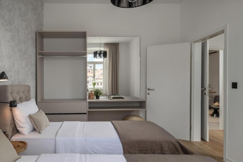 Postel nebo postele na pokoji v ubytování Apartment Centro Pola