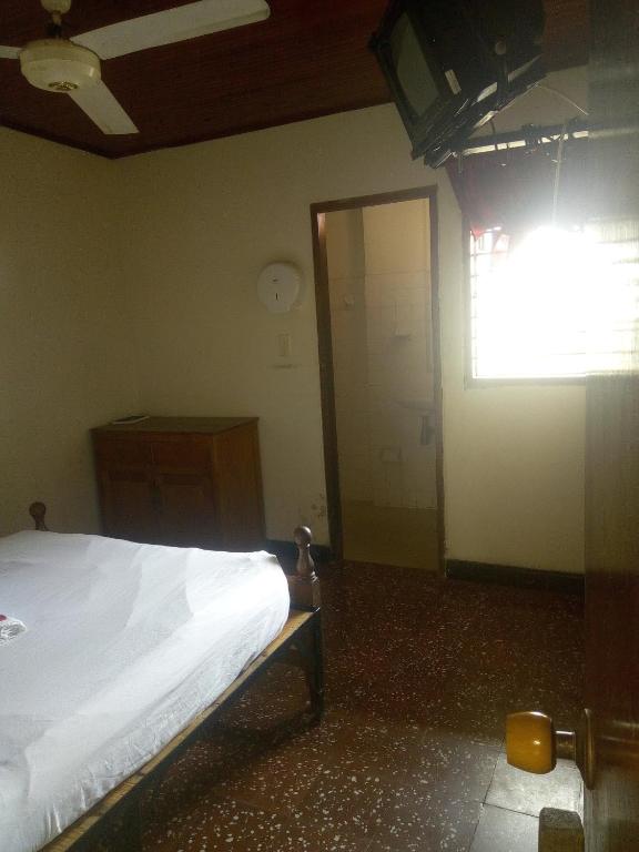 Postel nebo postele na pokoji v ubytování HOTEL en MONTERIA CITY