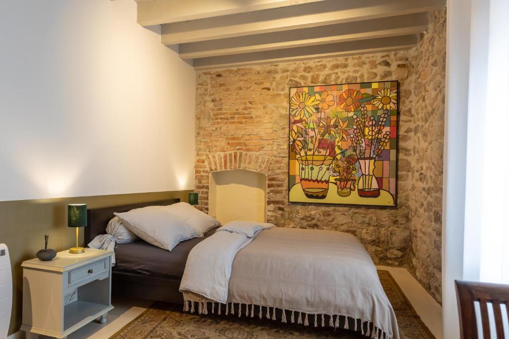 Postel nebo postele na pokoji v ubytování Domaine La Pomme de Pin