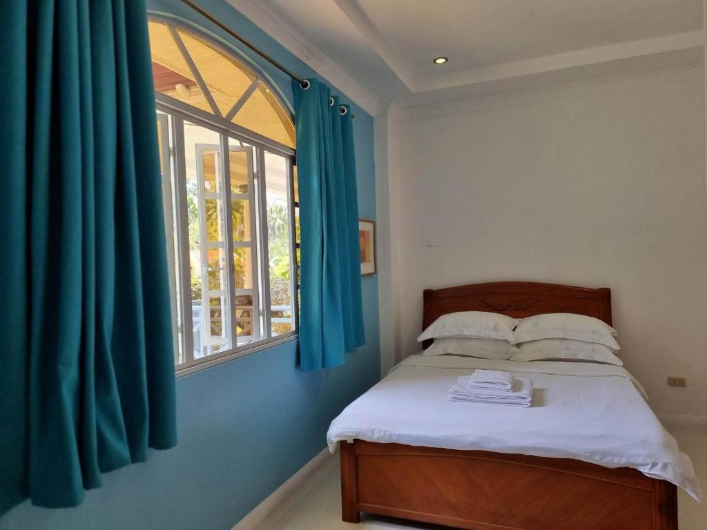 Postel nebo postele na pokoji v ubytování Bretthouse Tourist Inn