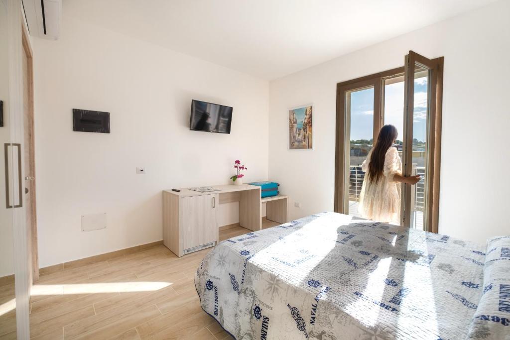 Postel nebo postele na pokoji v ubytování Villa Solymar