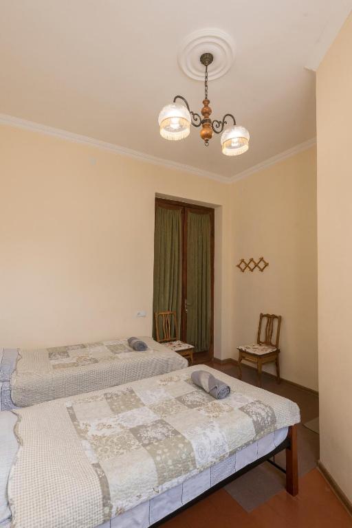 Postel nebo postele na pokoji v ubytování Tamari Guest House
