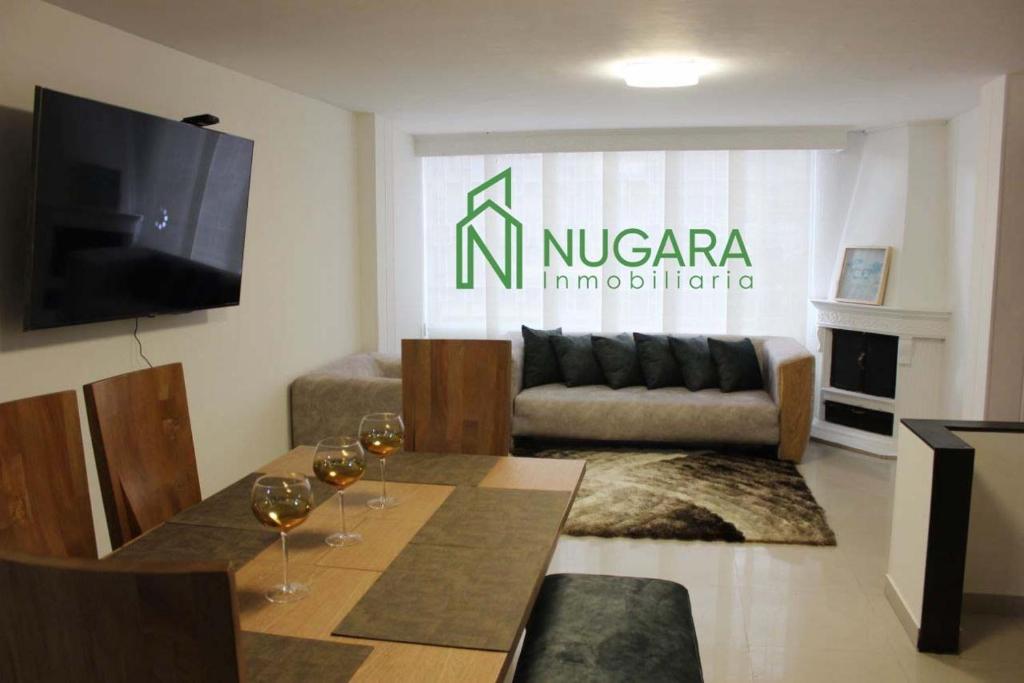TV a/nebo společenská místnost v ubytování Apartamento Super-Confortable