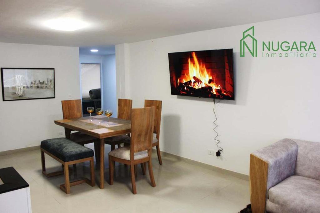 TV a/nebo společenská místnost v ubytování Apartamento Super-Confortable