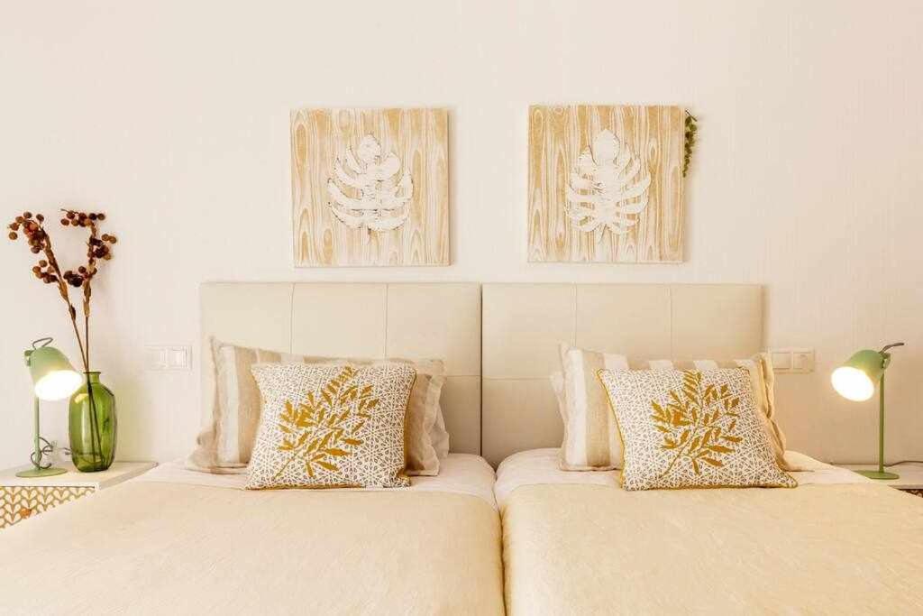 Posteľ alebo postele v izbe v ubytovaní Apartamento Pink VistaBella Sunrise