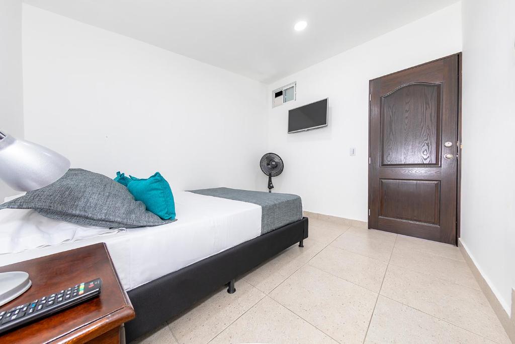 Postel nebo postele na pokoji v ubytování Hotel Ayenda Palo Alto