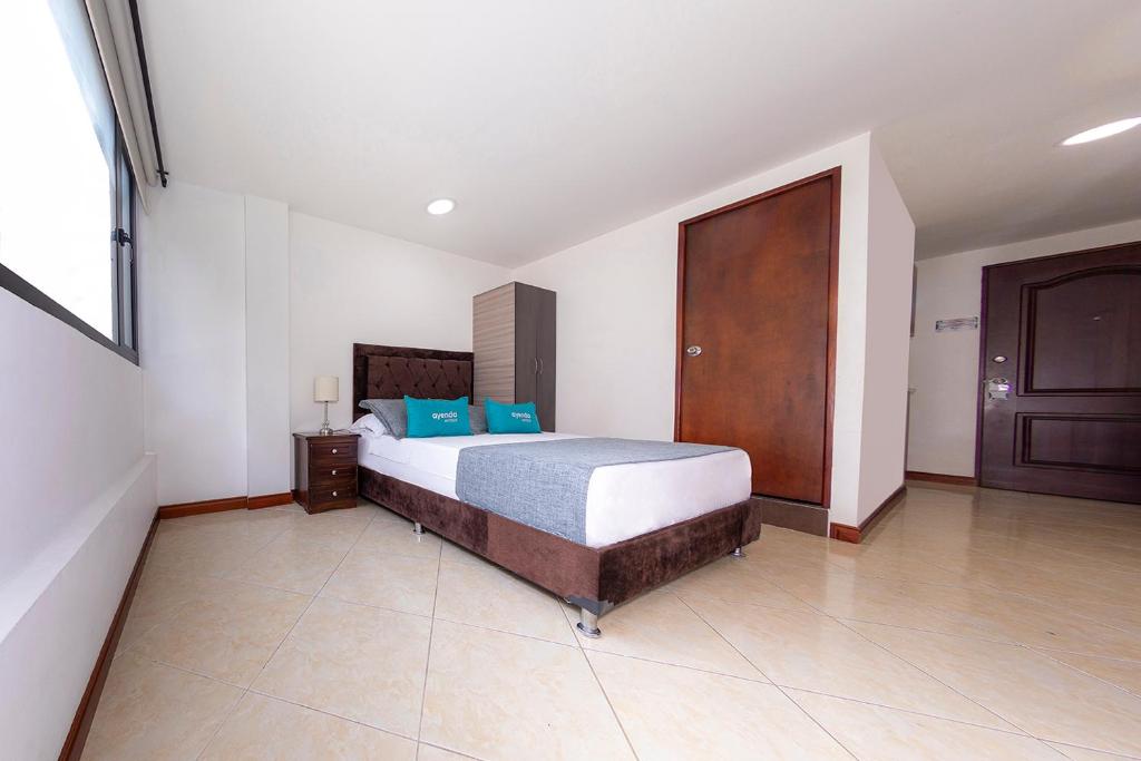 Postel nebo postele na pokoji v ubytování Hotel Ayenda Palo Alto