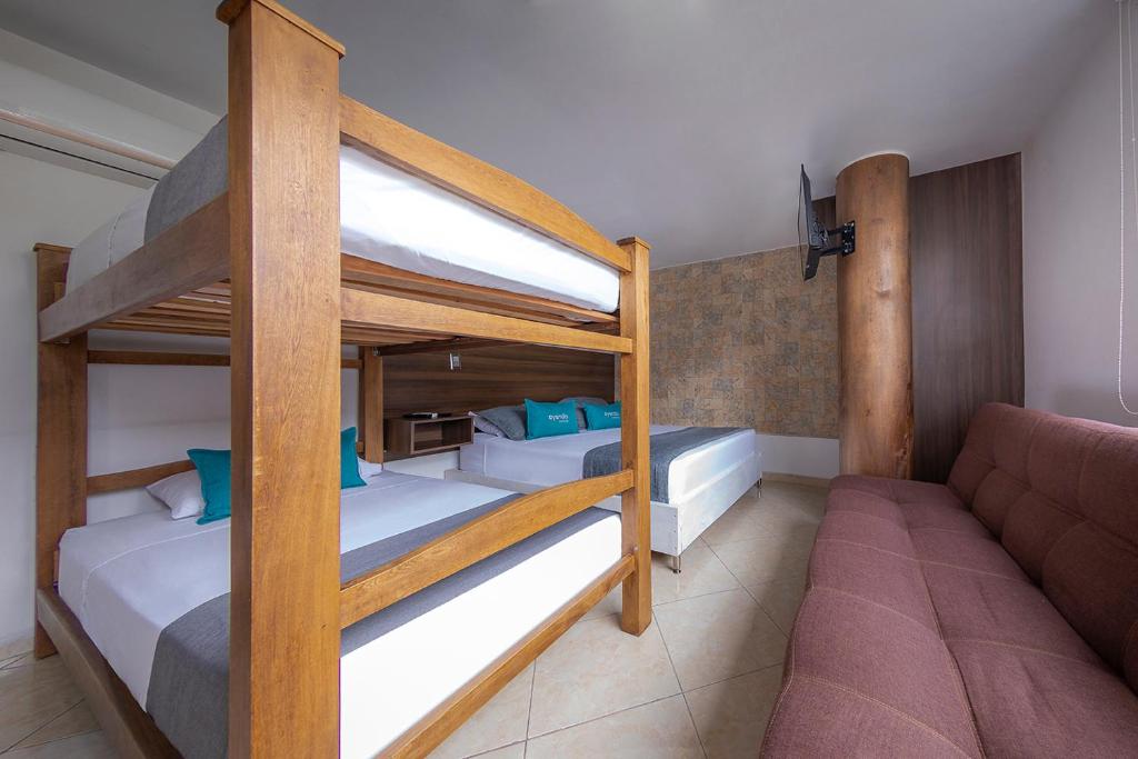 Postel nebo postele na pokoji v ubytování Hotel Ayenda Palo Alto