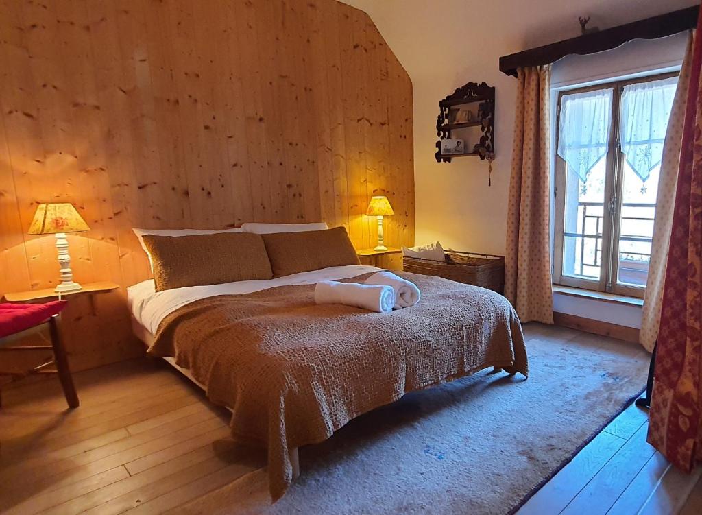 Postel nebo postele na pokoji v ubytování Le Castellou