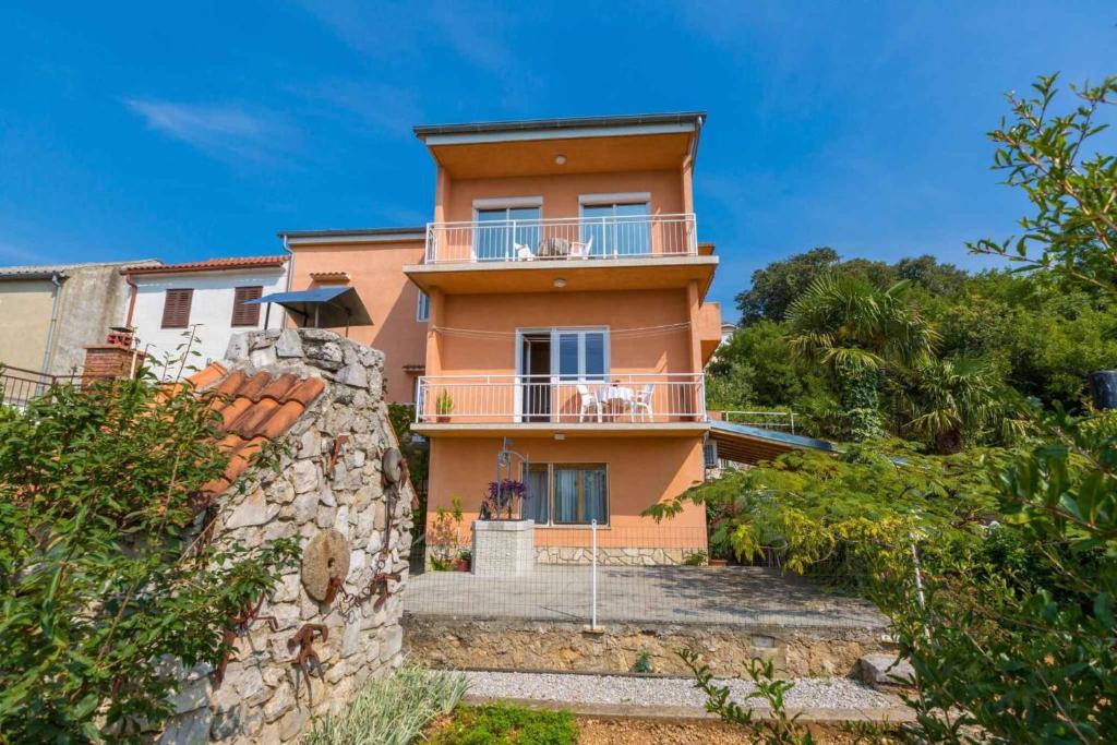 a house on the side of a hill at One-Bedroom Apartment in Crikvenica XVIII in Dramalj