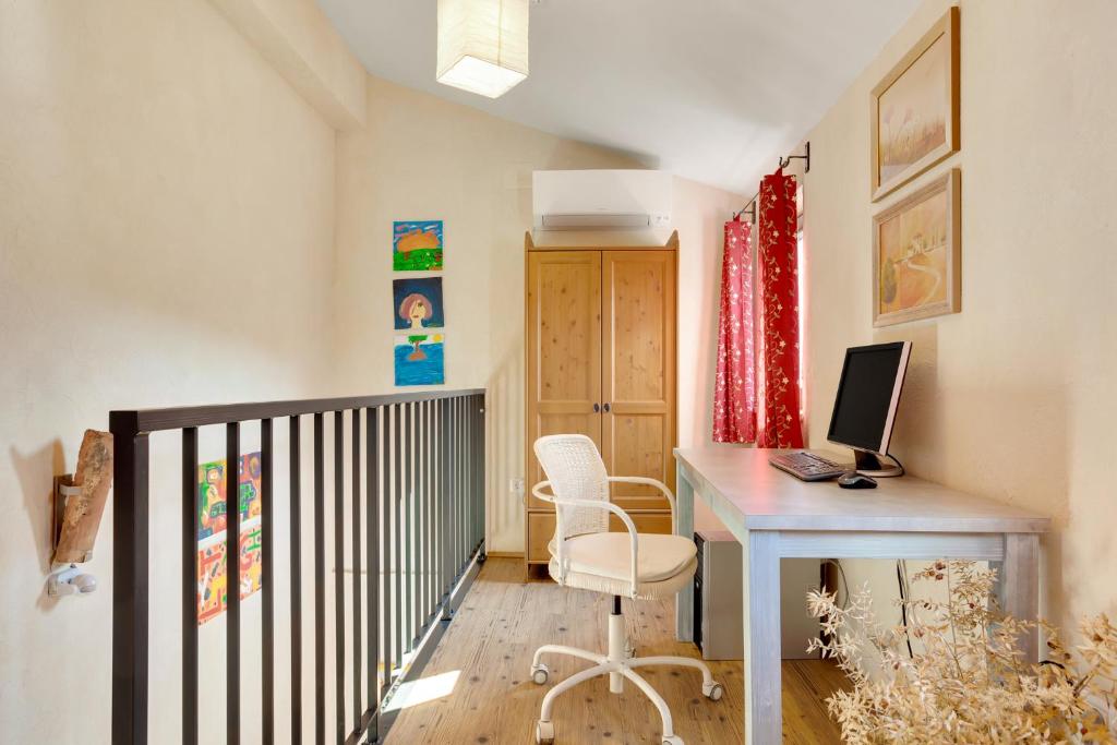 TV a/nebo společenská místnost v ubytování Flegi Holiday Home