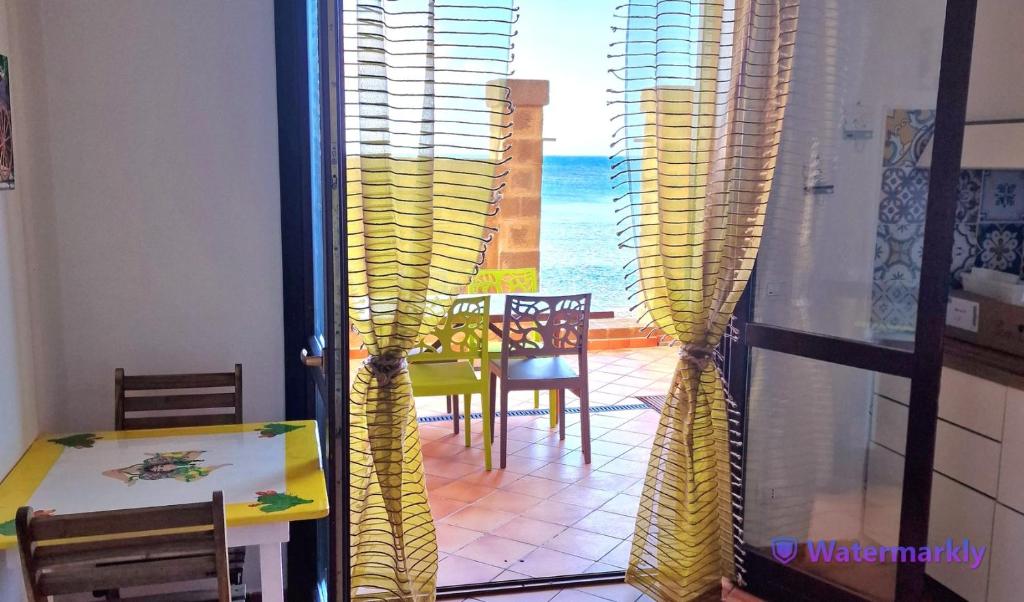 Balcone o terrazza di La Casa sulla Spiaggia