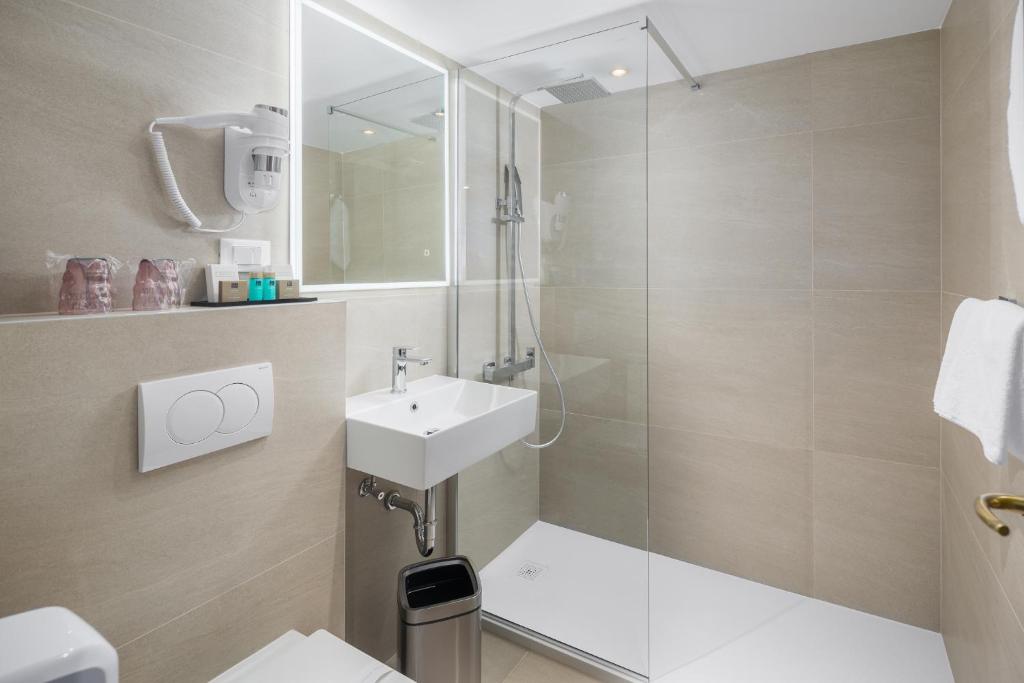 Koupelna v ubytování Hotel Cittar