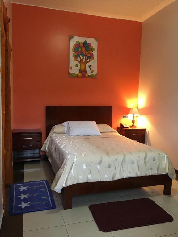 Postel nebo postele na pokoji v ubytování HOTEL El INDIO