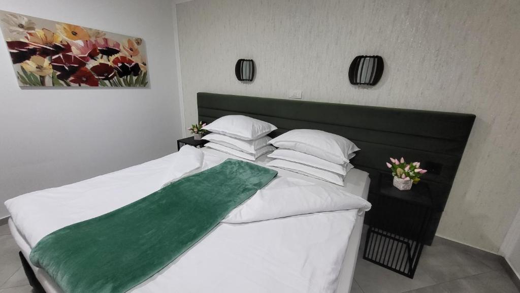Postel nebo postele na pokoji v ubytování Plitvice Inn