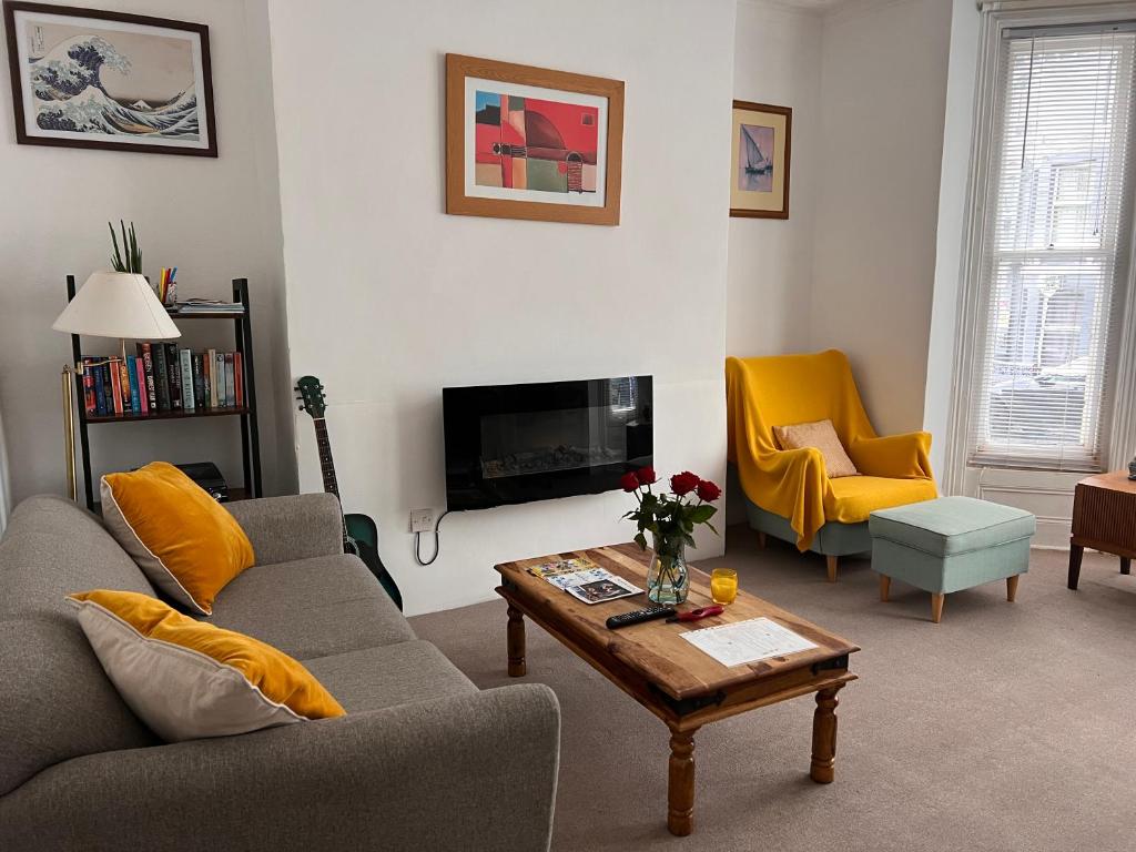 a living room with a couch and a coffee table at Lovely - 1 Bedroom Flat in Hastings Town Centre in Hastings