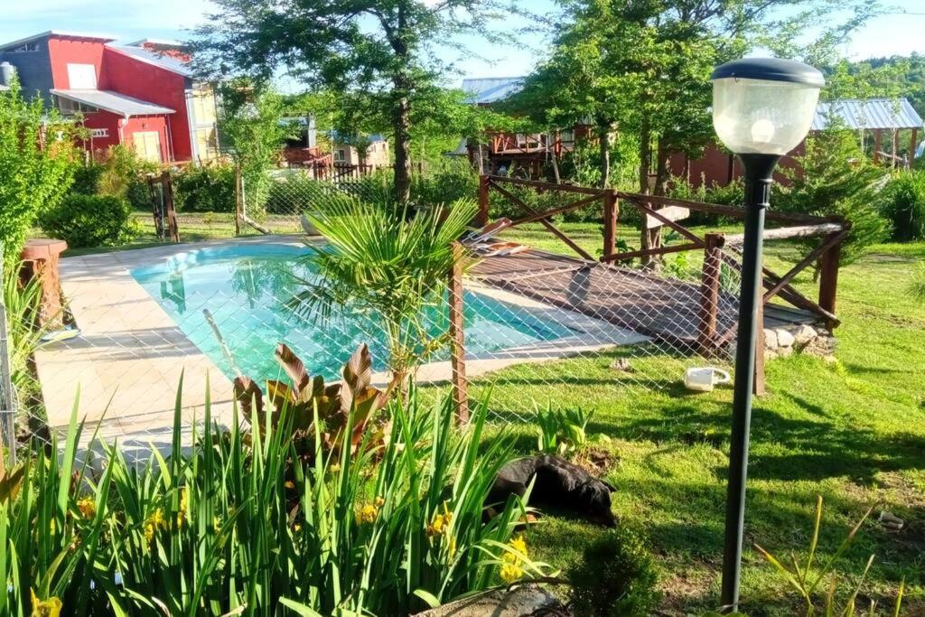Swimmingpoolen hos eller tæt på Cabañas Don Fernando