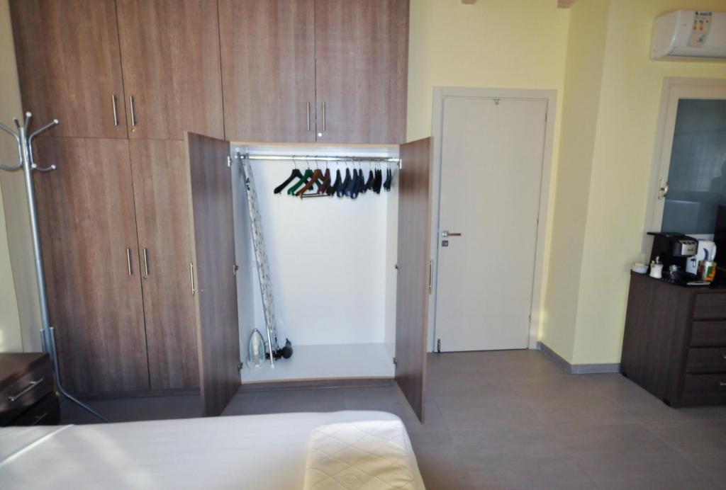 Postel nebo postele na pokoji v ubytování B&B in Corfu Town