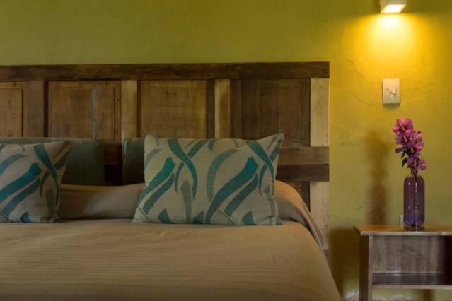 A bed or beds in a room at Avalenn, Casa de Campo
