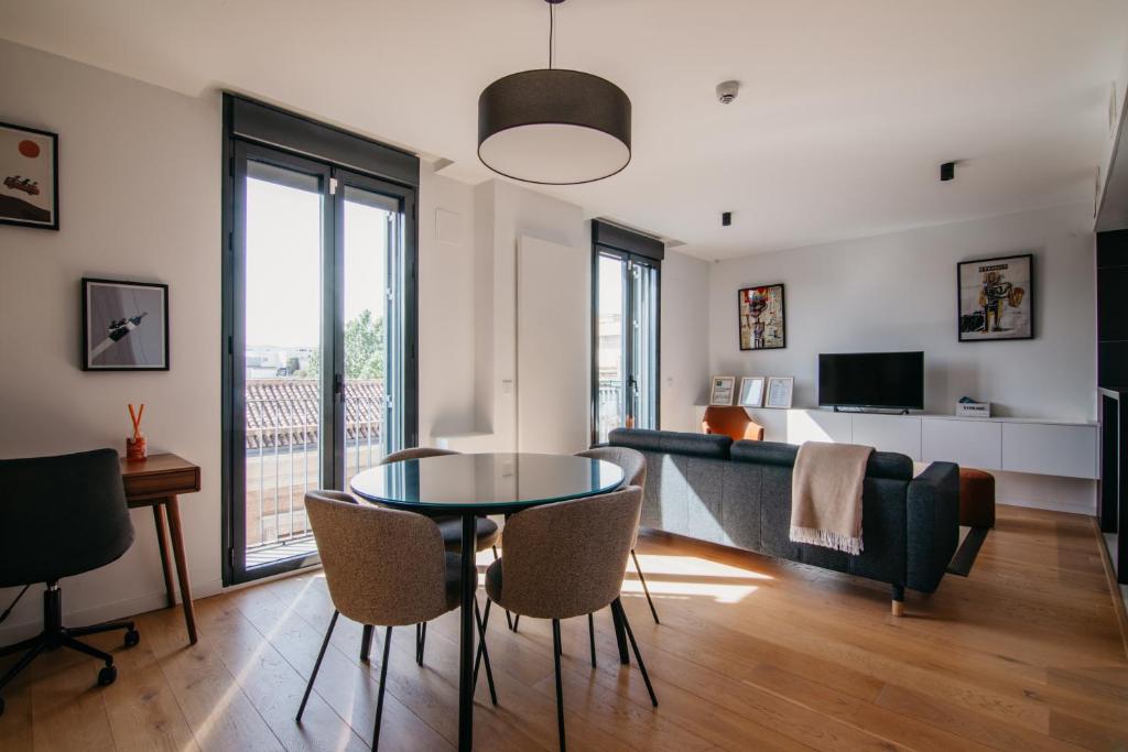 TV a/nebo společenská místnost v ubytování tuGuest Obispo Apartment