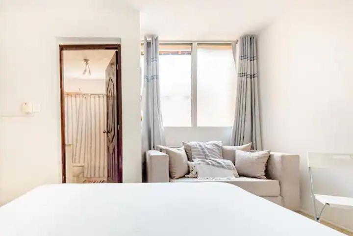 Postel nebo postele na pokoji v ubytování Rincón Caribeño Habitación Privada en Apartamento