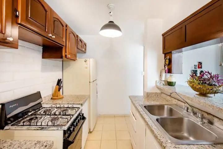 Kuchyň nebo kuchyňský kout v ubytování Rincón Caribeño Habitación Privada en Apartamento