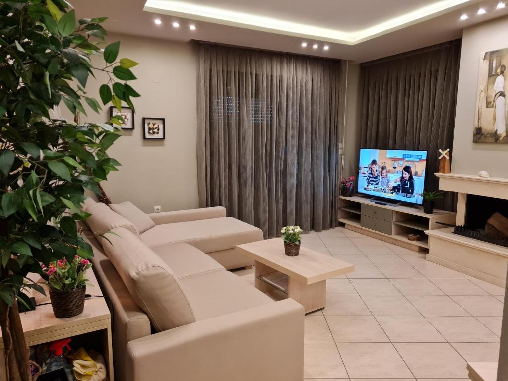 TV a/nebo společenská místnost v ubytování Toroni Pearl