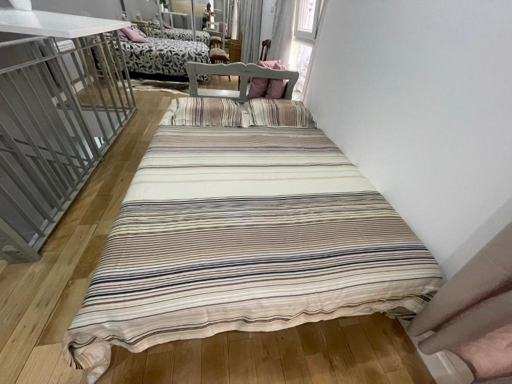 Fotografia z galérie ubytovania Grand Appartement au rez de chaussée en plein cœur de Paris v Paríži