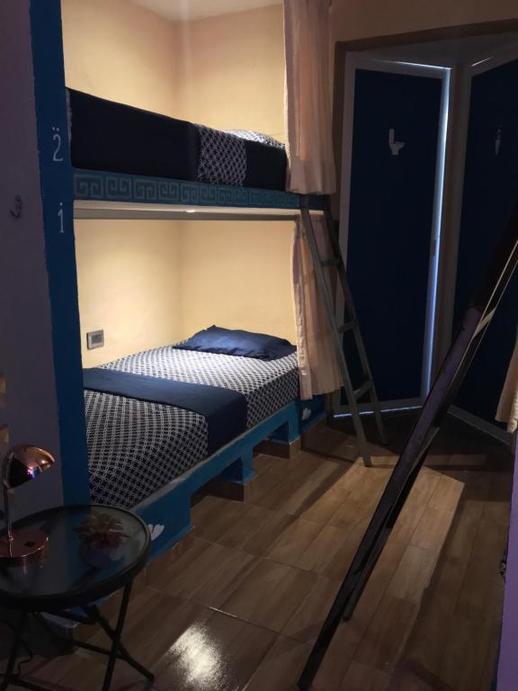 Bunk bed o mga bunk bed sa kuwarto sa Venado 28