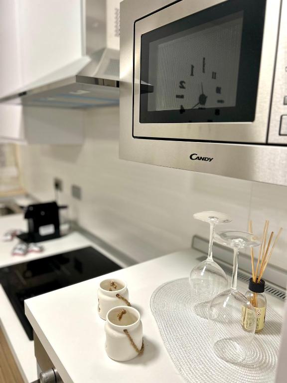 A kitchen or kitchenette at NEWHOUSE ROOFTOP - Super Penthouse Seaview