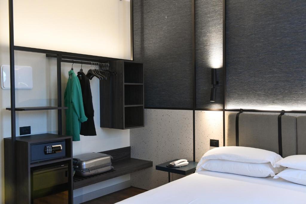 Postel nebo postele na pokoji v ubytování Hotel Eden