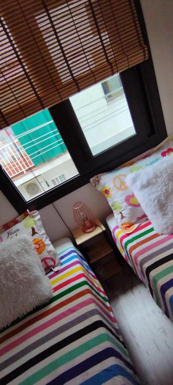 Postel nebo postele na pokoji v ubytování Apartment Barca 1 Camp Nou