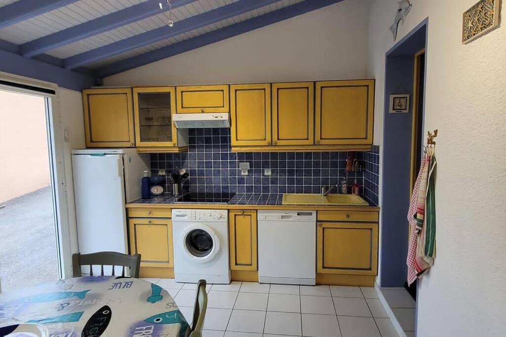 A cozinha ou cozinha compacta de Charmante Maison de p&ecirc;cheur