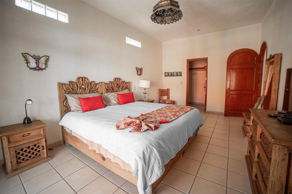 Postel nebo postele na pokoji v ubytování Casa Don Pascual Hotel Boutique Sweet Home