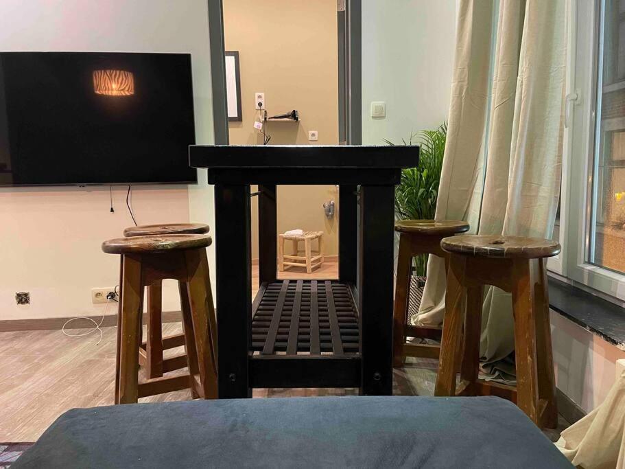TV a/nebo společenská místnost v ubytování Appartement hyper centre 1