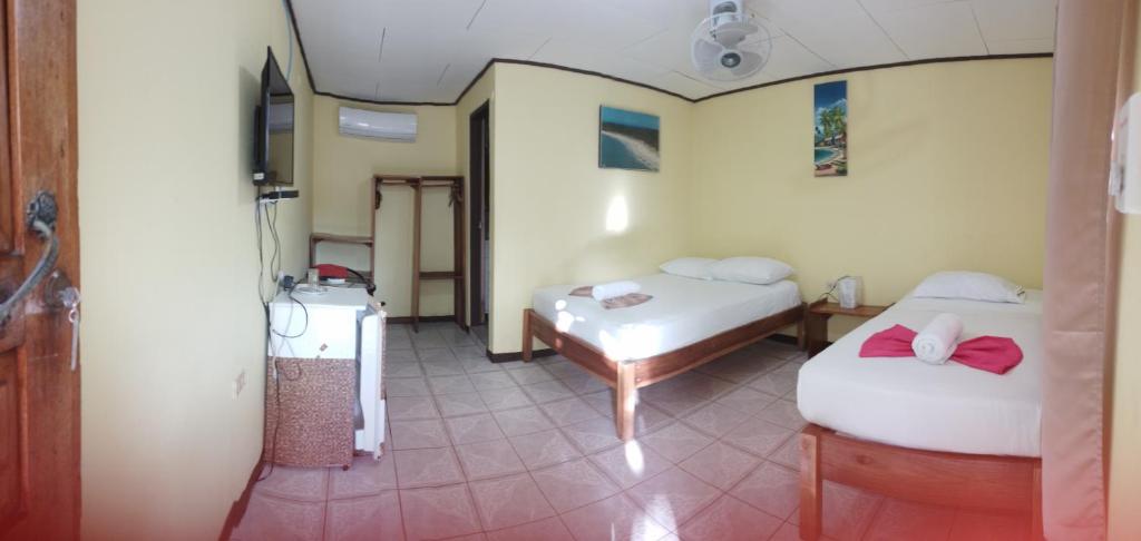 Postel nebo postele na pokoji v ubytování Cabinas Smith