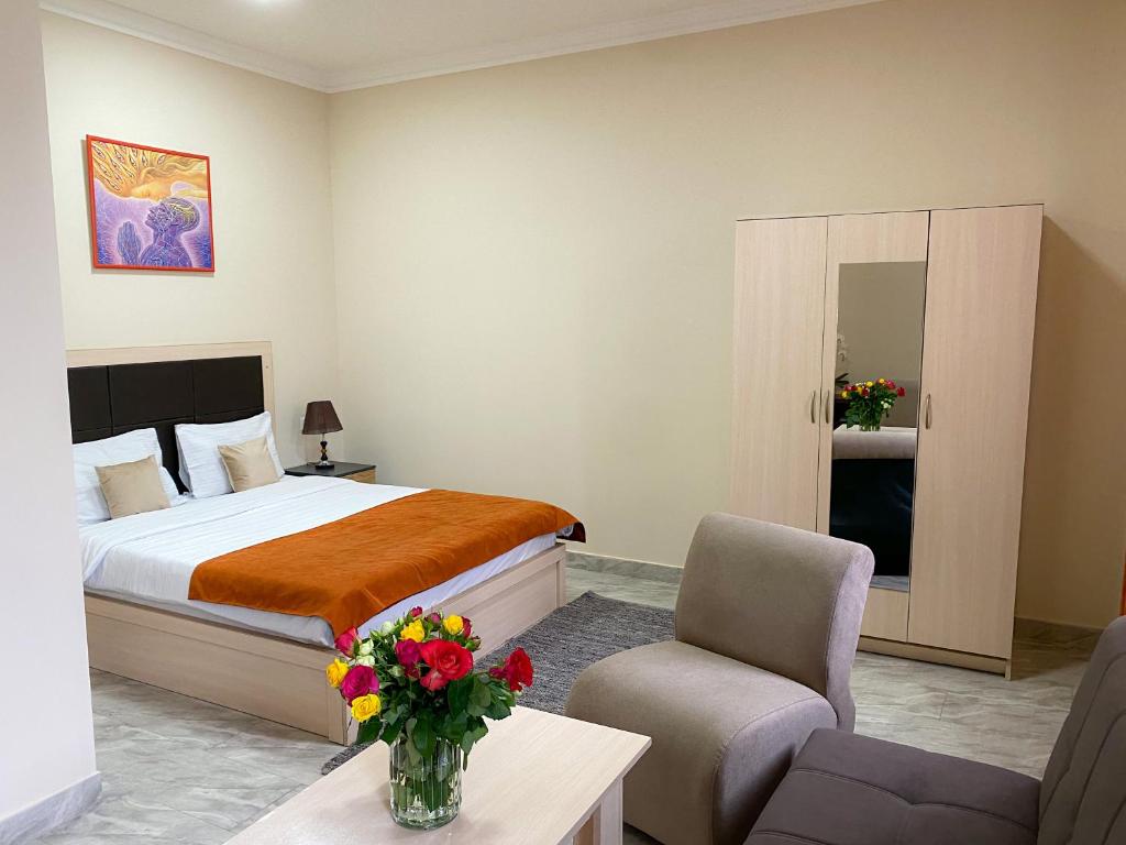 Кровать или кровати в номере Alex Hotel