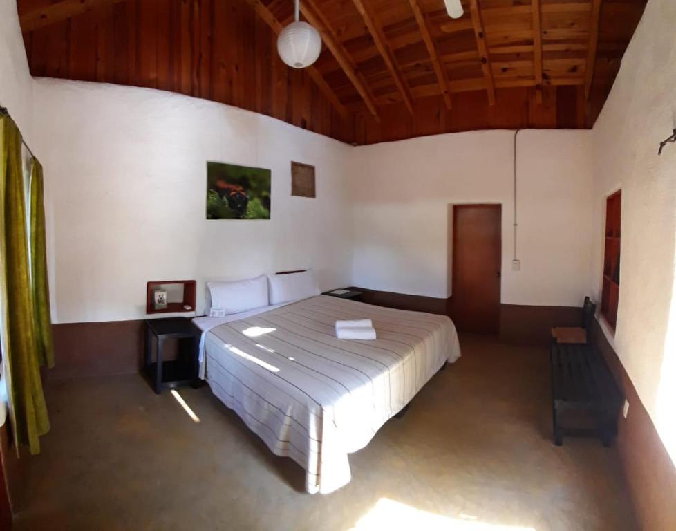 Postel nebo postele na pokoji v ubytování Cabañas Sierra Gorda