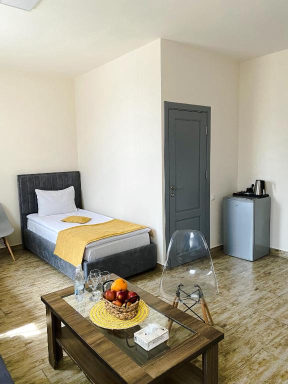 Кровать или кровати в номере Alex Hotel
