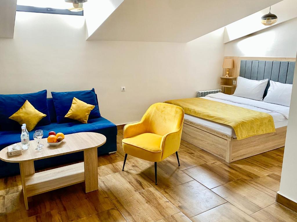 Кровать или кровати в номере Alex Hotel