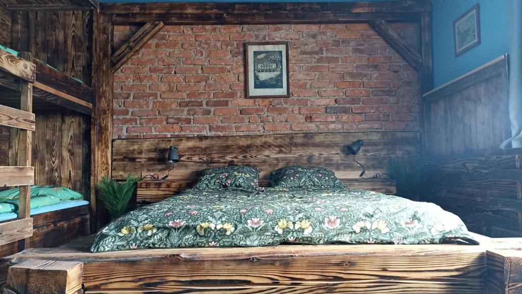 Postel nebo postele na pokoji v ubytování Planinski dom Janče
