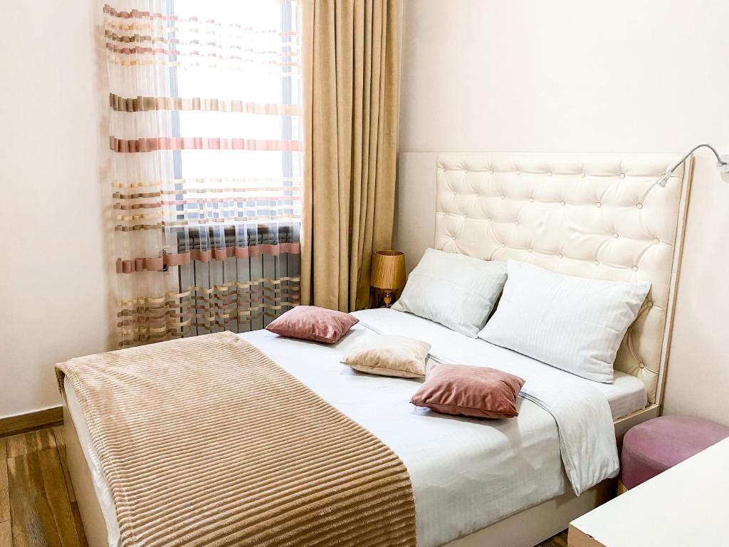 Кровать или кровати в номере Alex Hotel