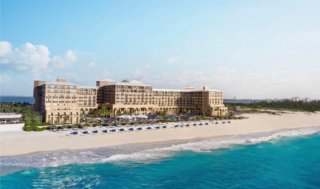 an aerial view of a resort on the beach at Kempinski Hotel Cancun in Cancún